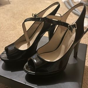 Black size 7 1/2 women’s BCBG platform heels